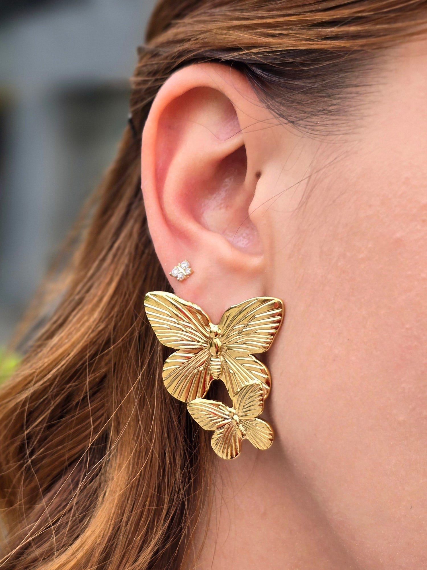 Brass aritos grandes doble mariposa