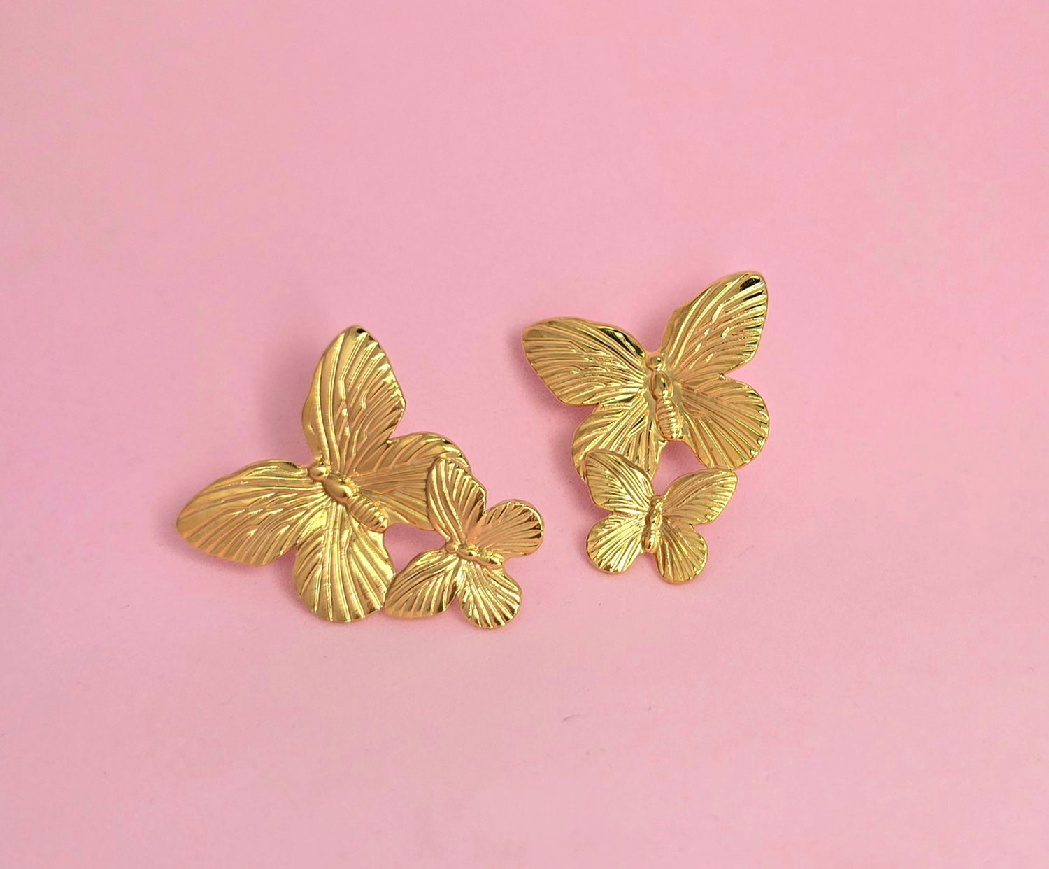 Brass aritos grandes doble mariposa